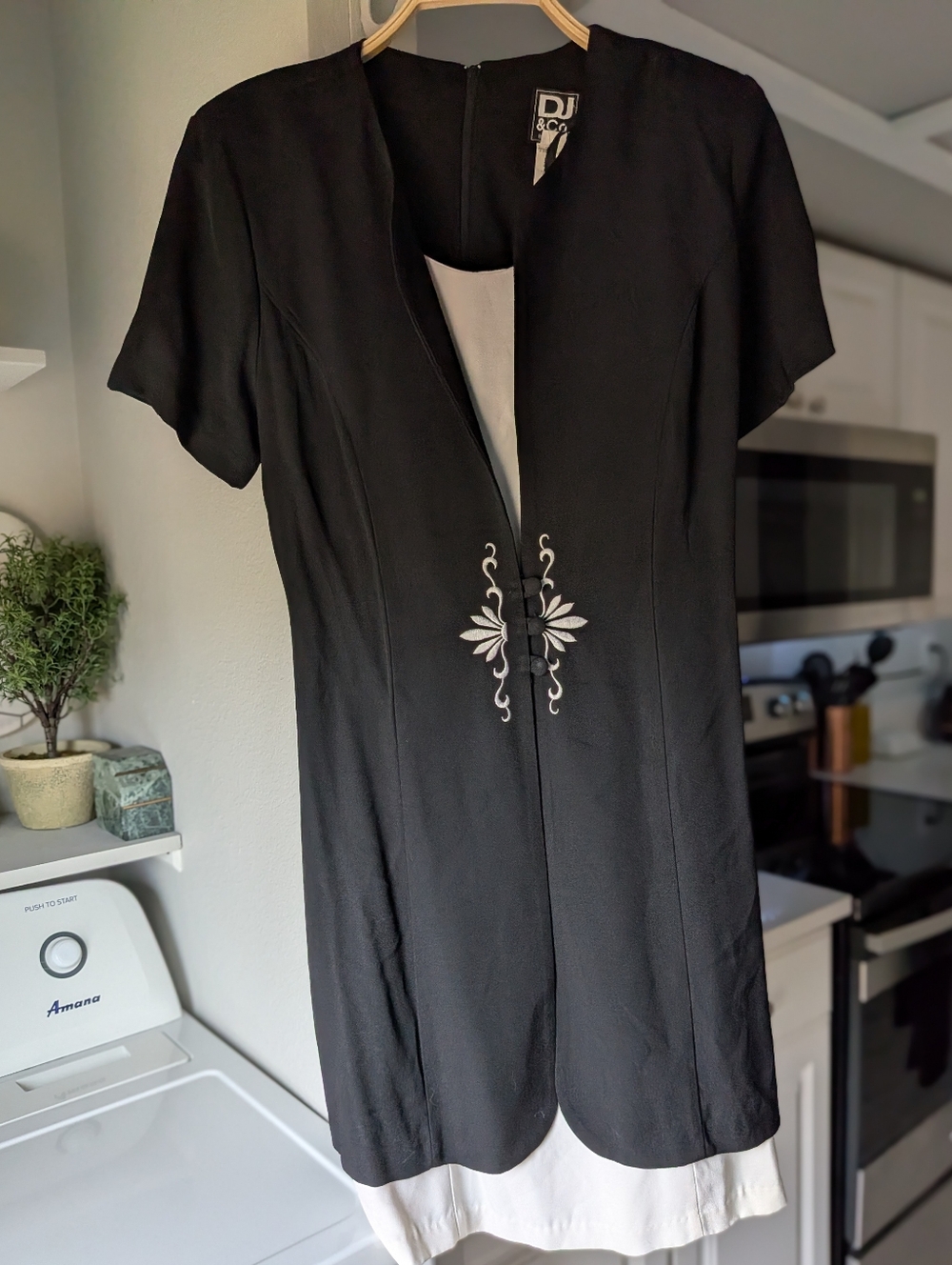 Elegant Black and White Women's Dress With Embroidered Detail